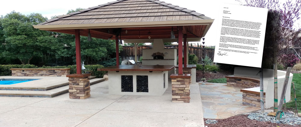 Pizza oven outdoor kitchen concrete countertops center pub island bar full masonry seat walls adjacent to swimming pool by GPT Cosntruction Masonry & Design